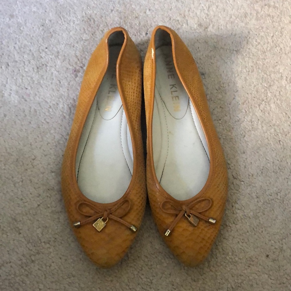 Yellow snakeskin ballet flat with bow detail